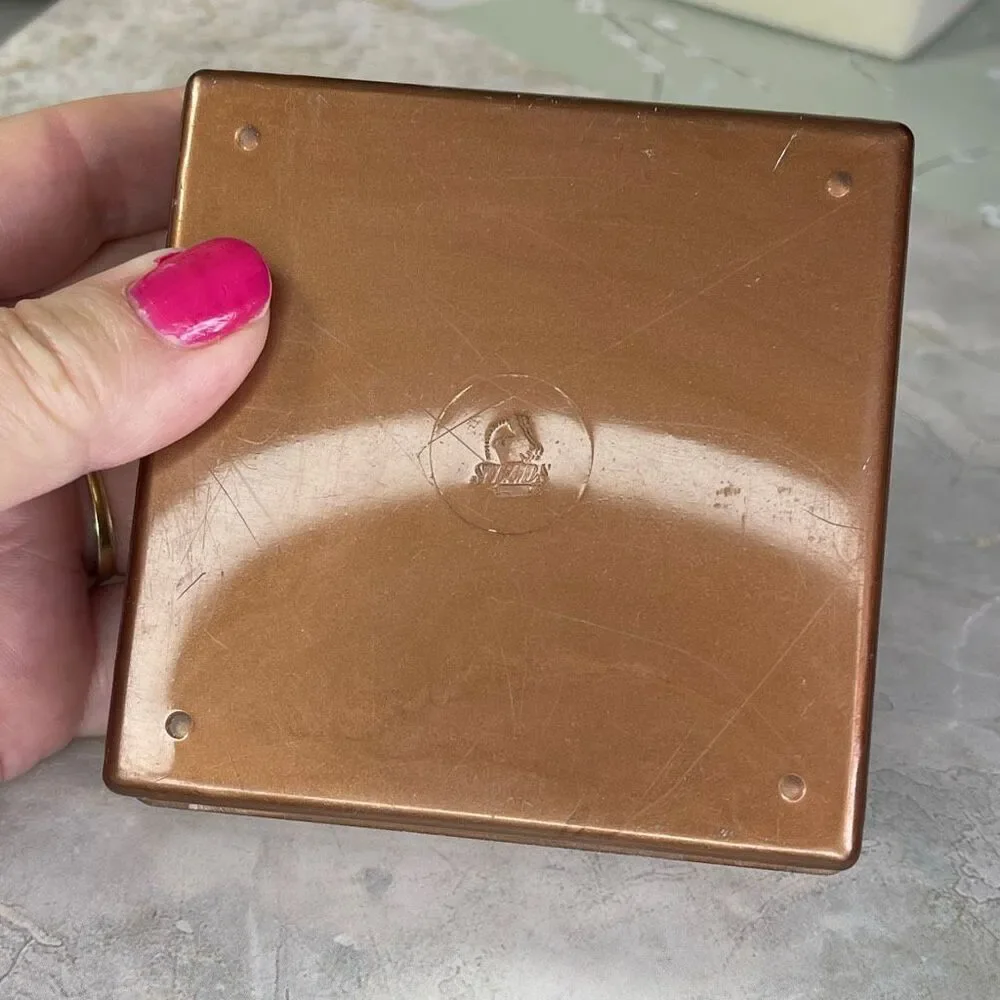 Vintage Midcentury Steeds The Jewel Box coaster set copper colored plastic.